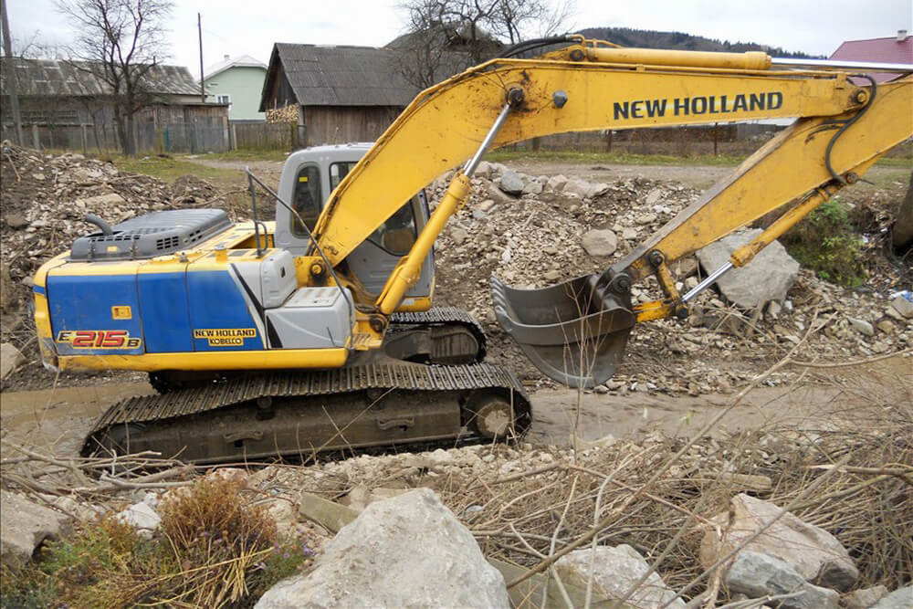 Екскаватор New Holland E215